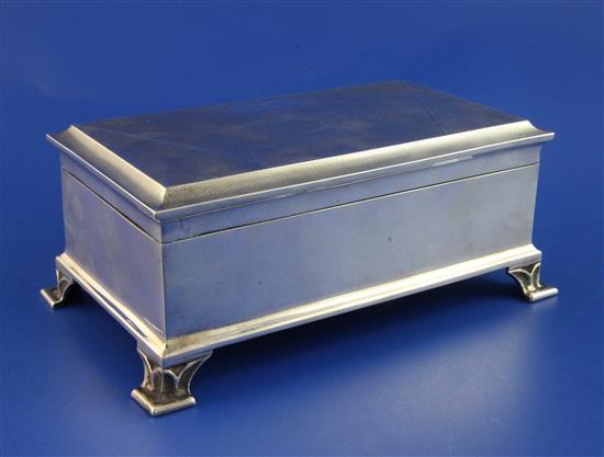 A 1930s Art Deco engine turned silver cigarette box, 7.25in.